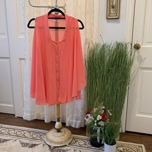 Peach sleeveless flowing button-down dressy top. YA brand. Excellent condition.